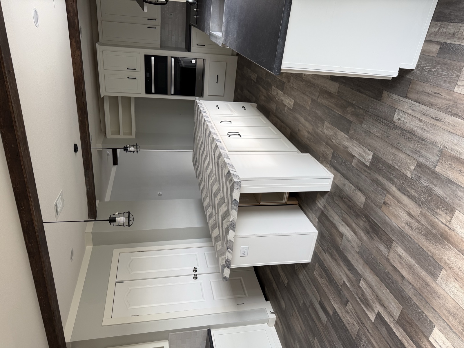 Island kitchen with stainless appliances