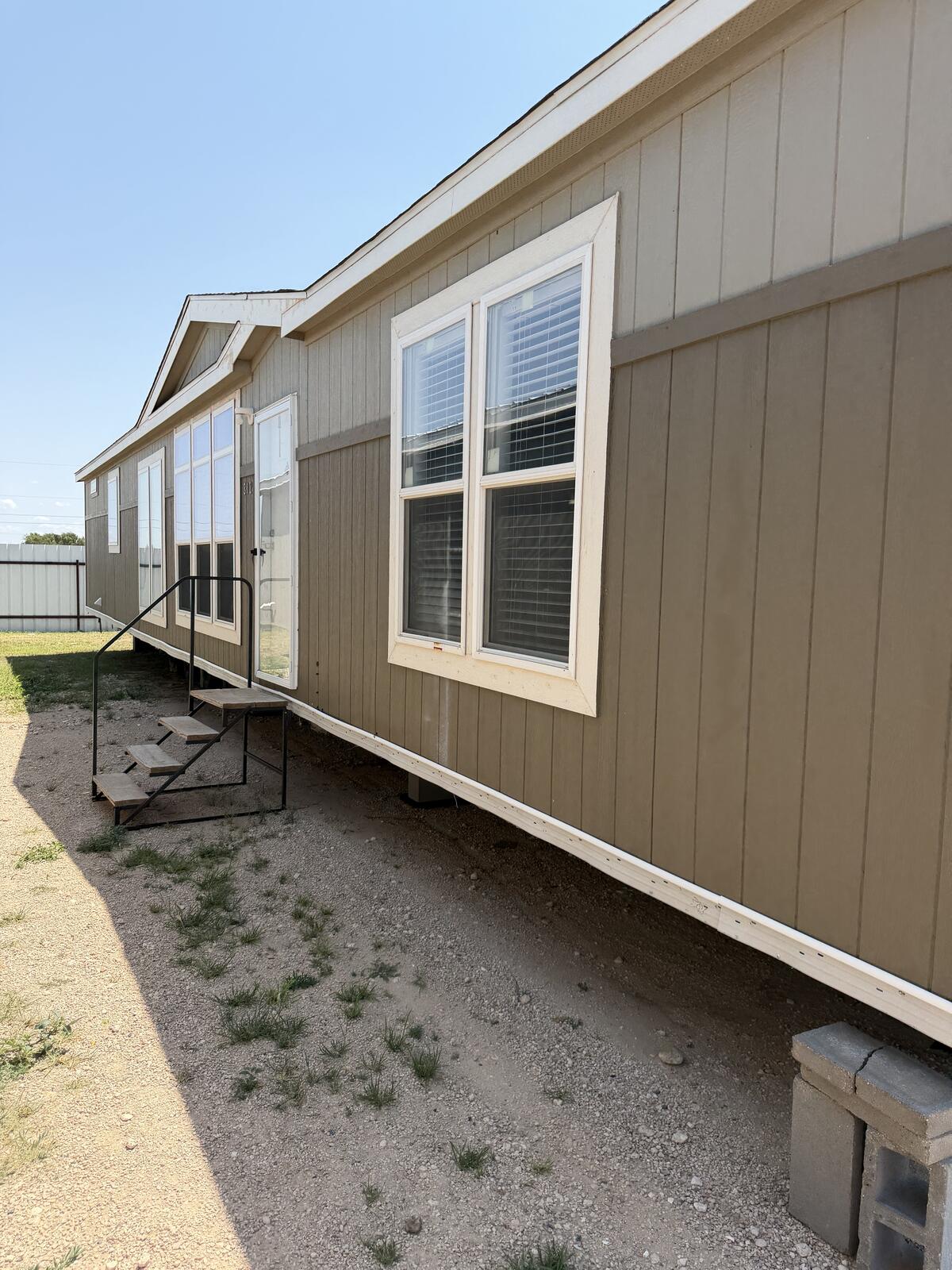2021 Champion 32×62 — Exterior — front curb view