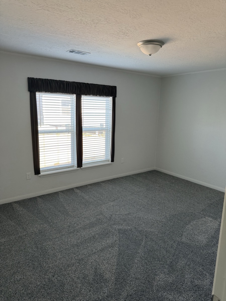 2023 Deming Solitaire 32×82 — Bedroom interior