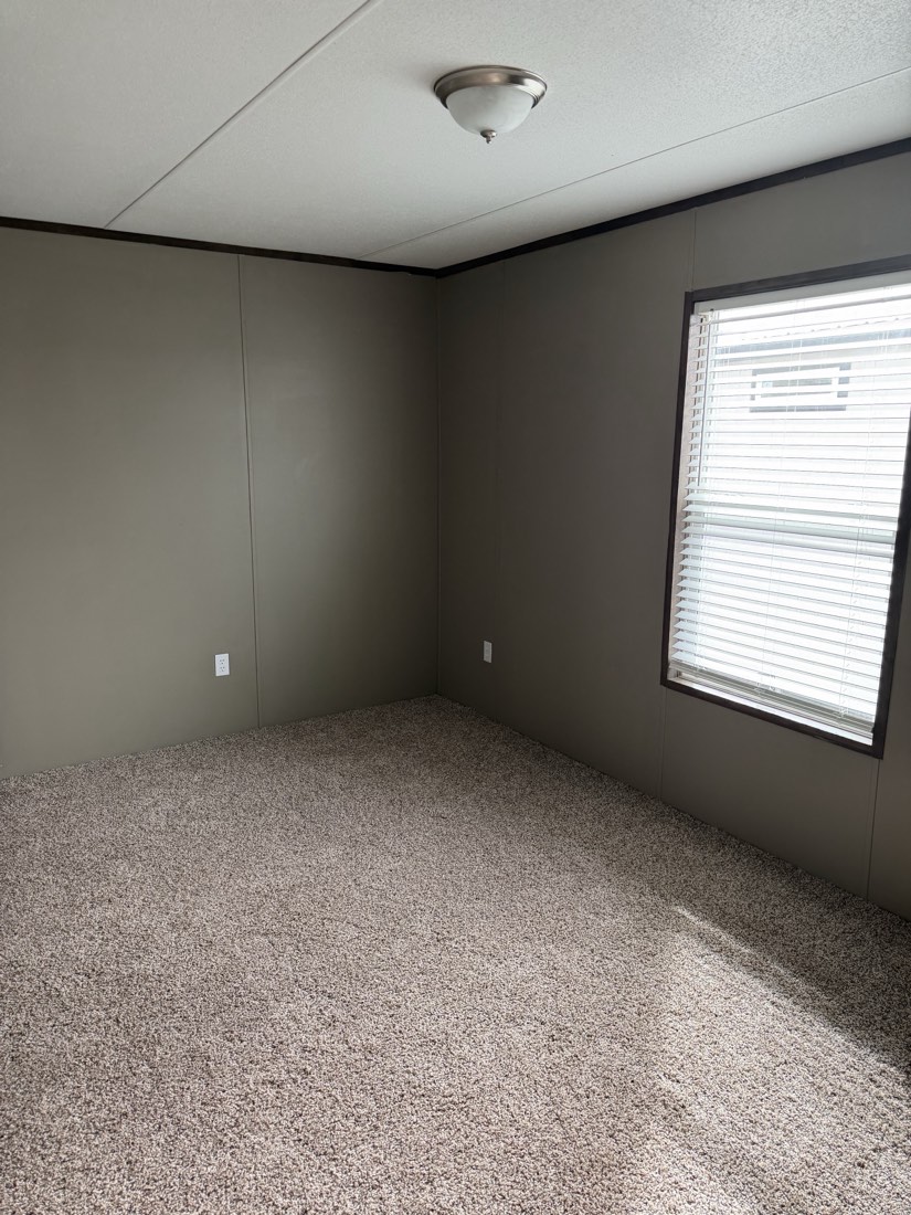 Bedroom with carpet