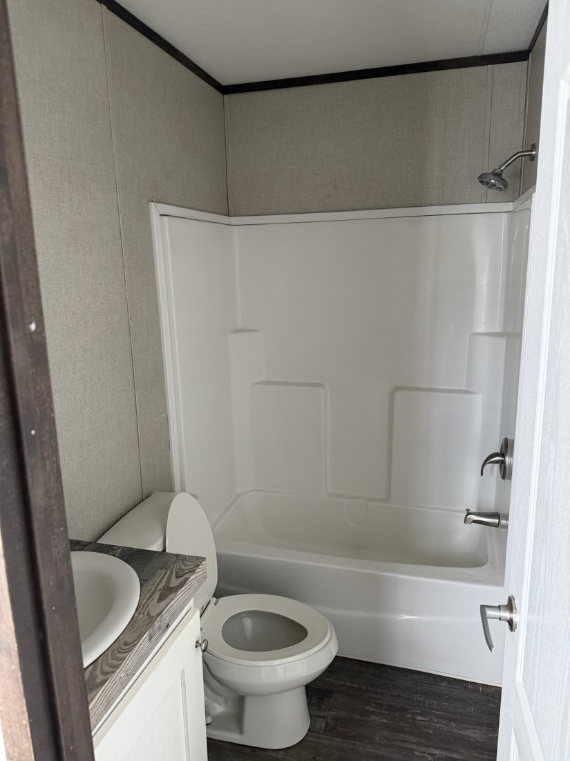 Bathroom with tub and shower