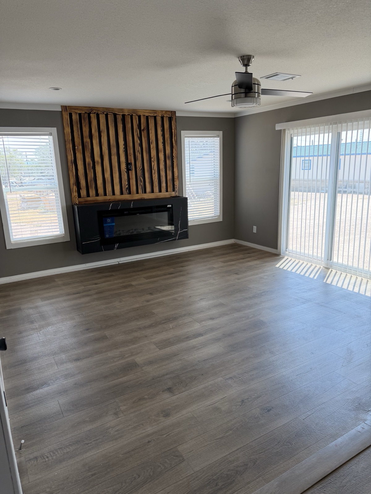 2025 Champion 32x76 living room with fireplace