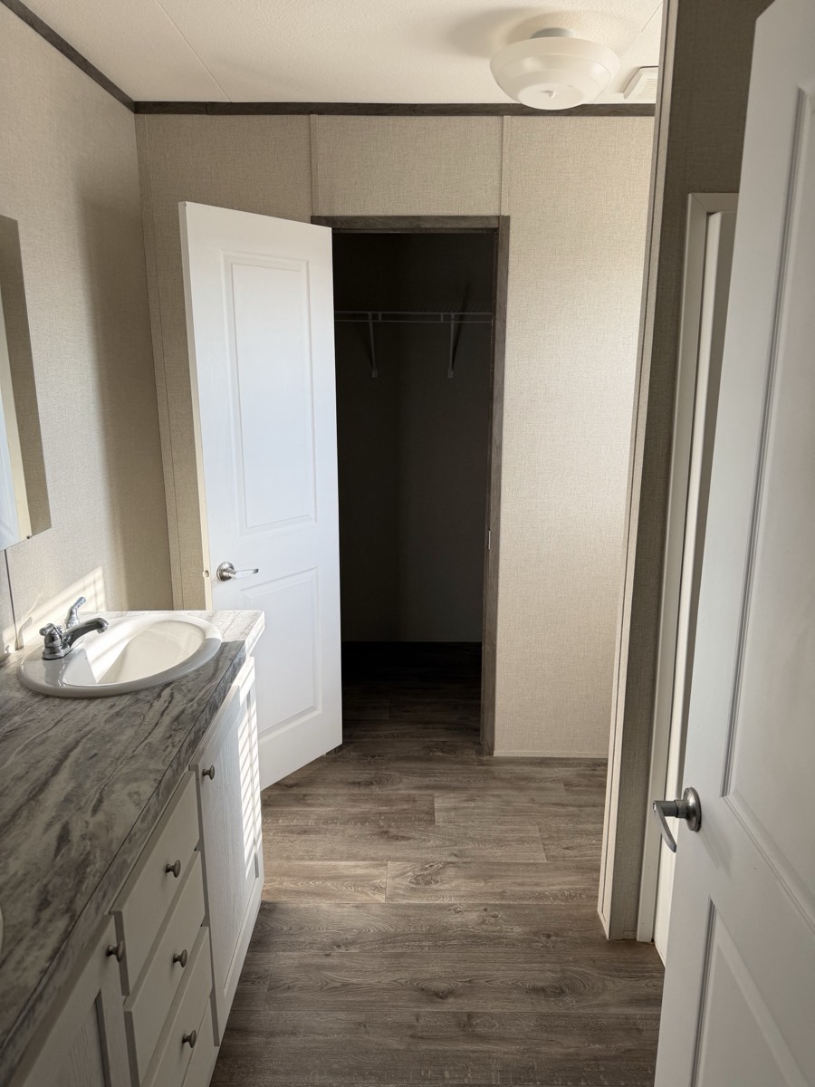 2025 Jessup Panama 28×56 — Bathroom vanity and closet