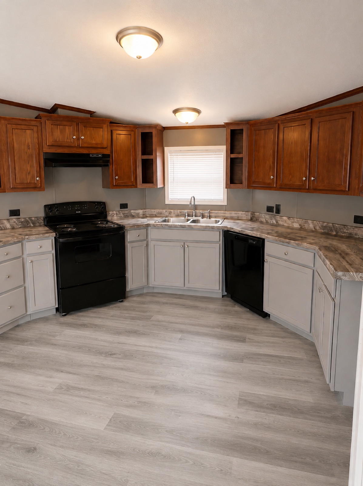 Kitchen with electric range and ample cabinets